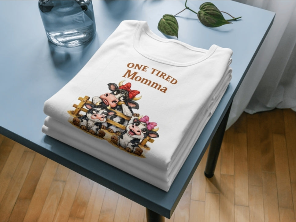 One Tired Momma™ Graphic T-Shirt – Funny Mom Shirt with Cow Design